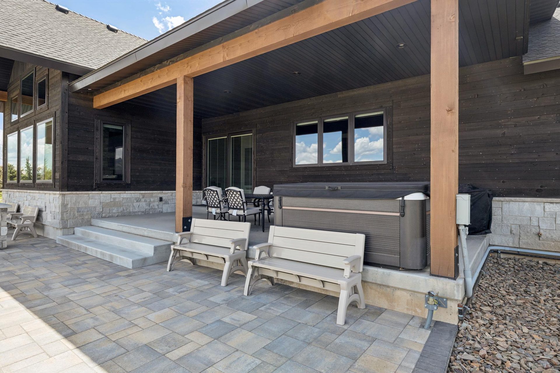 Covered lakeside deck with panoramic views of the water and surrounding wilderness