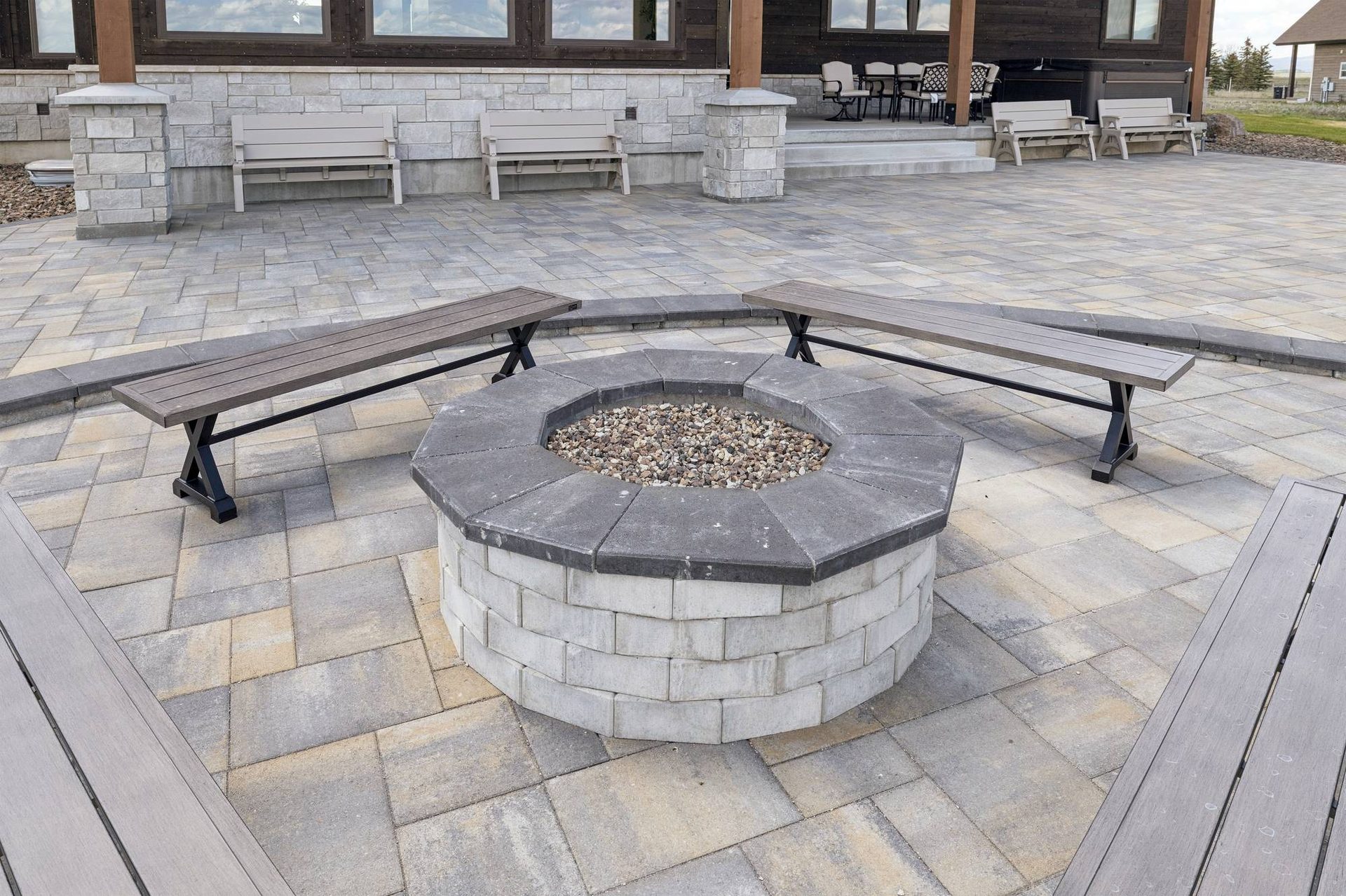 Stone firepit on the lake-view patio with Yellowstone-region vistas