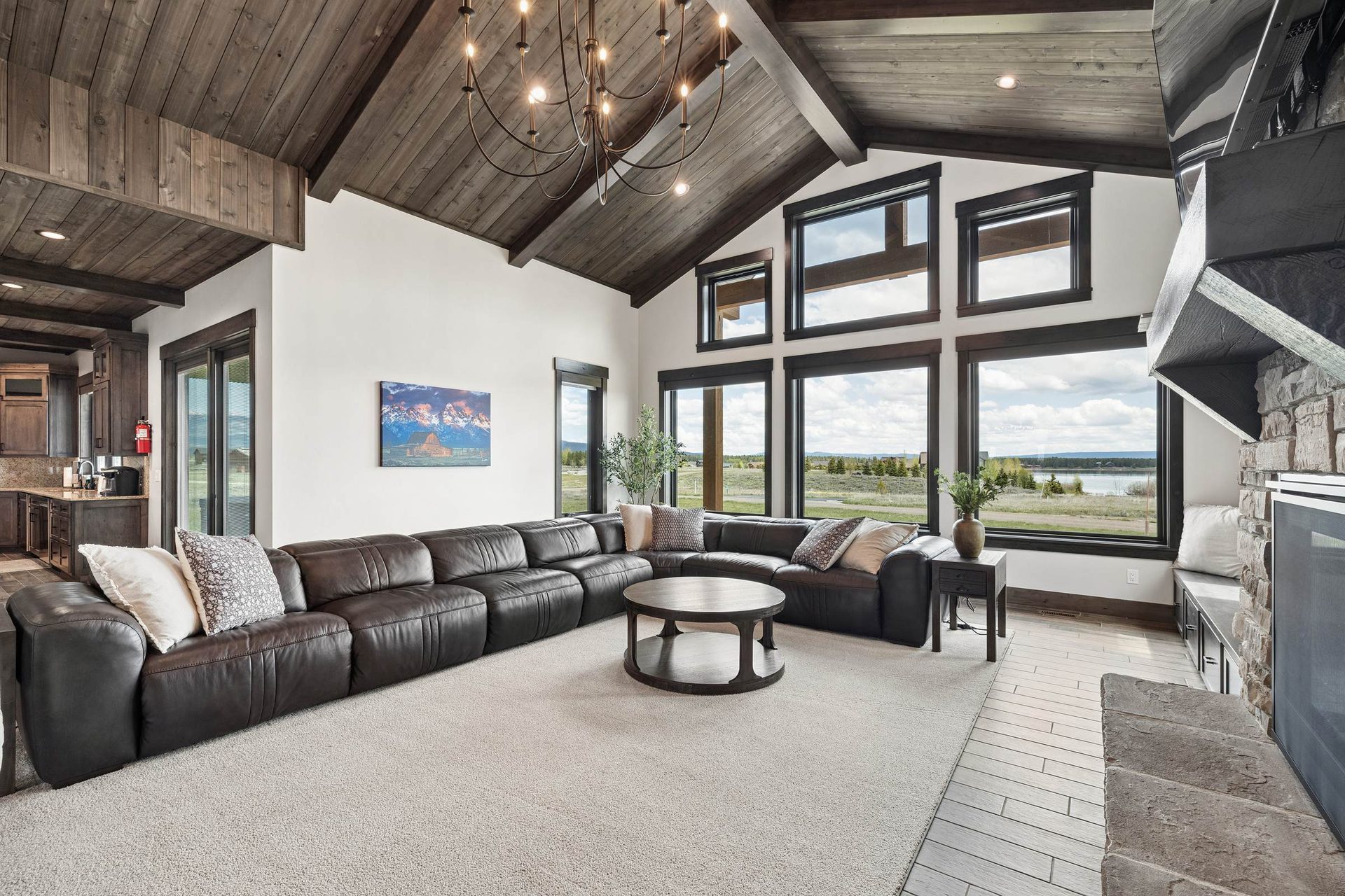 Great room by the fireplace, set for evening beverages and conversation