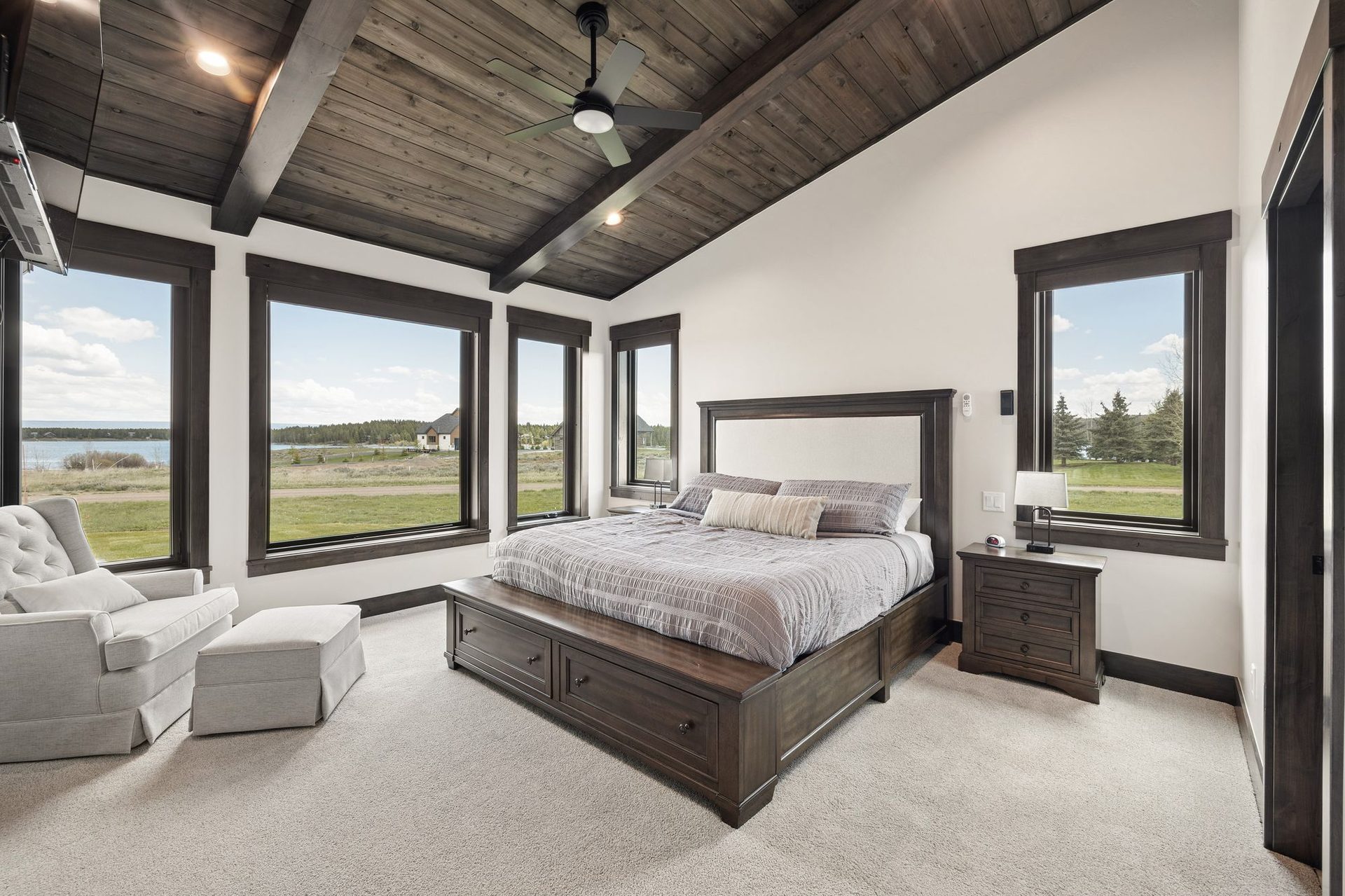 Elite executive suite with king bed, vaulted ceiling and refined finishes
