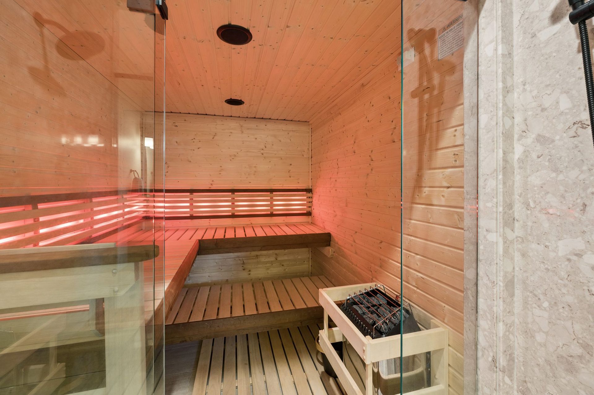 Executive wellness retreat sauna at Iron Slide Lodge
